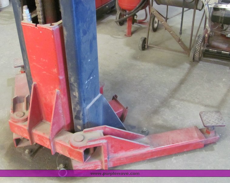 image for item 4499 Pelton two auto lift