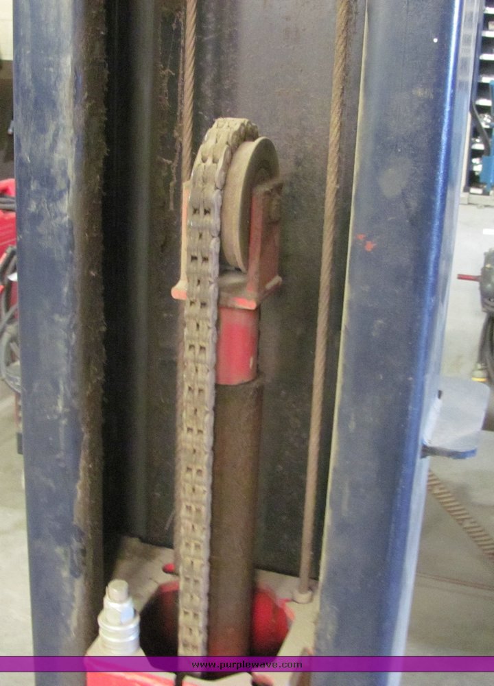 image for item 4499 Pelton two auto lift