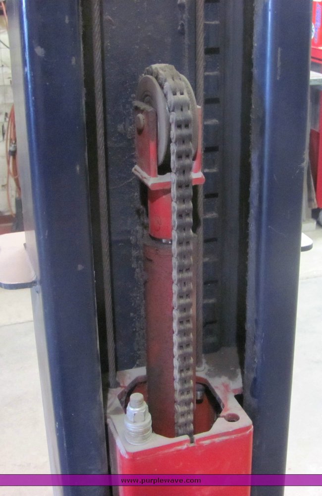 image for item 4499 Pelton two auto lift