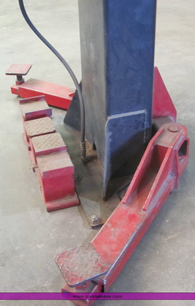 image for item 4499 Pelton two auto lift
