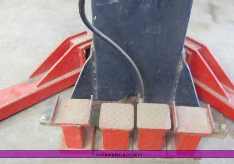 image for item 4499 Pelton two auto lift