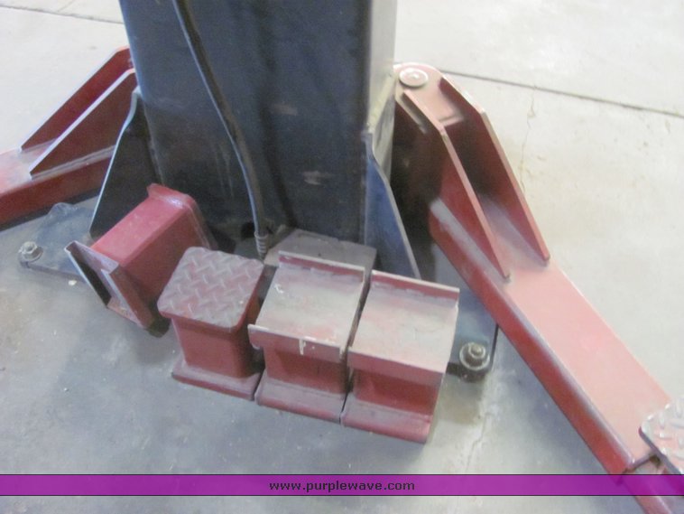 image for item 4499 Pelton two auto lift