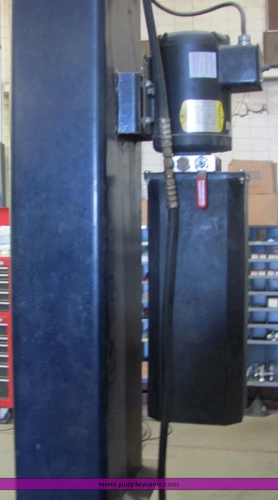 image for item 4499 Pelton two auto lift