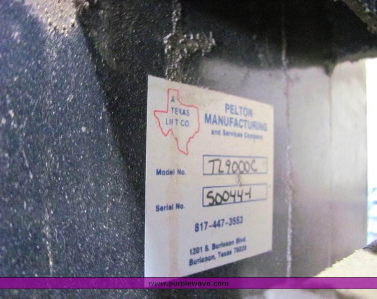 image for item 4499 Pelton two auto lift