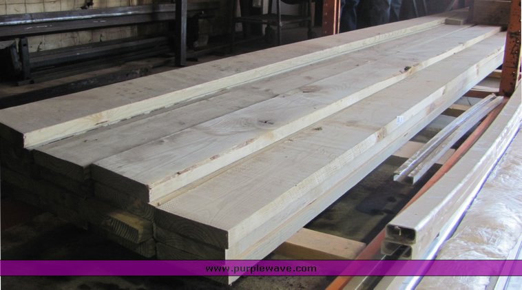 image for item 4536 (21) 2" x 8" treated lumber
