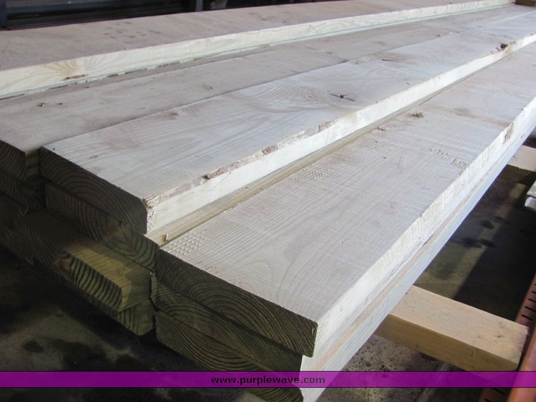 image for item 4536 (21) 2" x 8" treated lumber