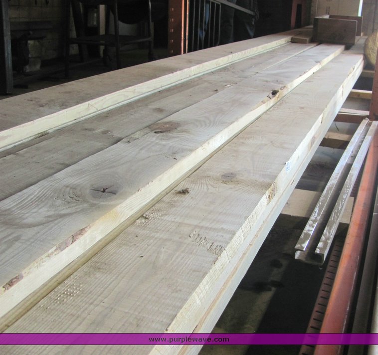 image for item 4536 (21) 2" x 8" treated lumber