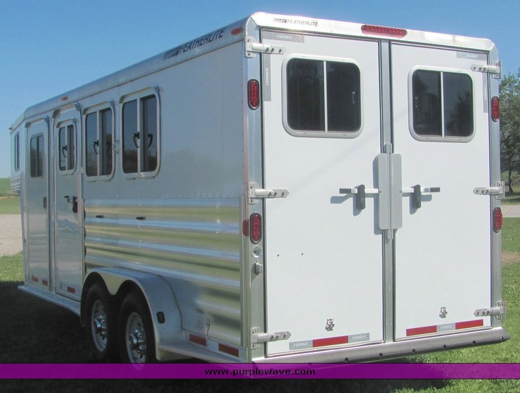 image for item 4567 2007 Feather Lite aluminum three horse slant trailer