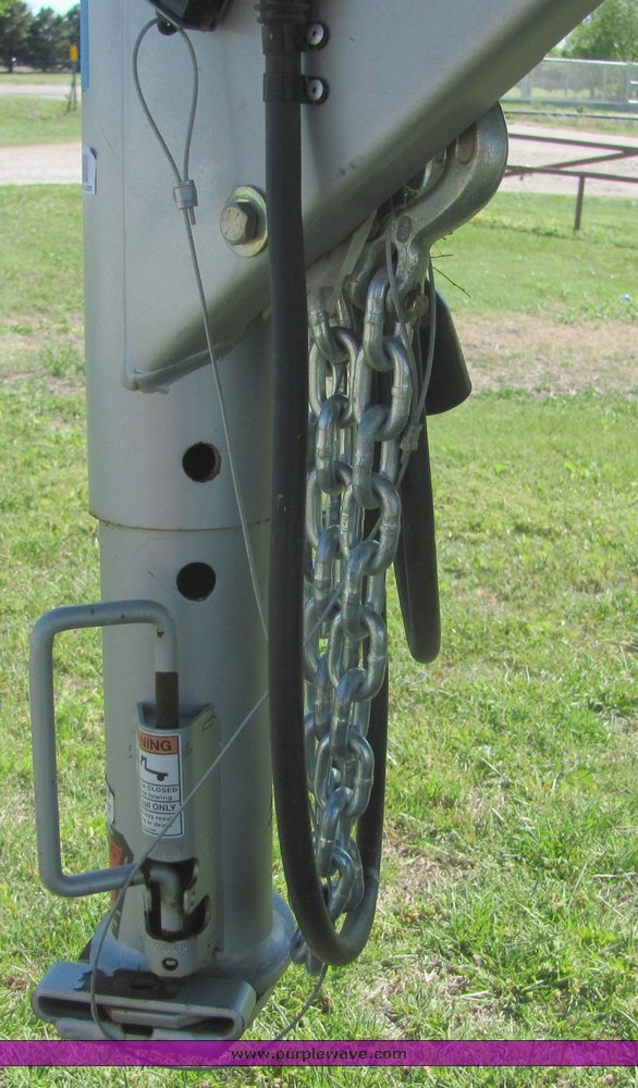 image for item 4567 2007 Feather Lite aluminum three horse slant trailer