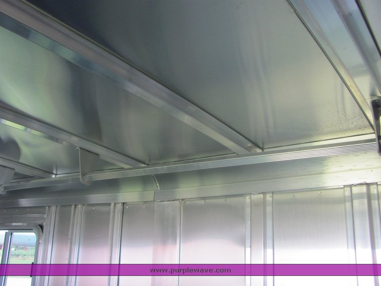 image for item 4567 2007 Feather Lite aluminum three horse slant trailer