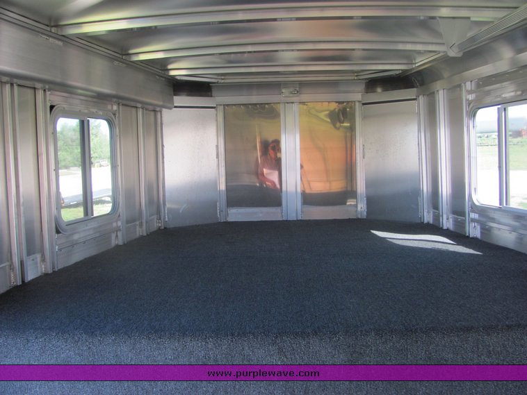 image for item 4567 2007 Feather Lite aluminum three horse slant trailer