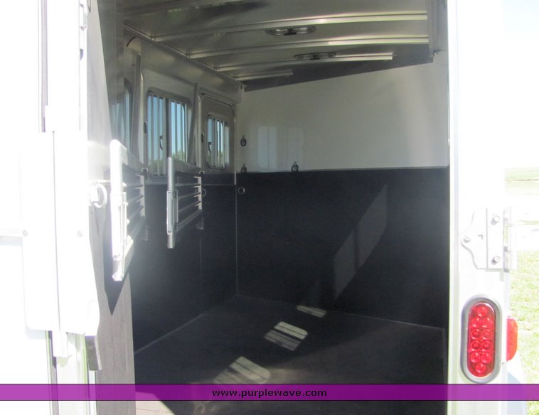 image for item 4567 2007 Feather Lite aluminum three horse slant trailer