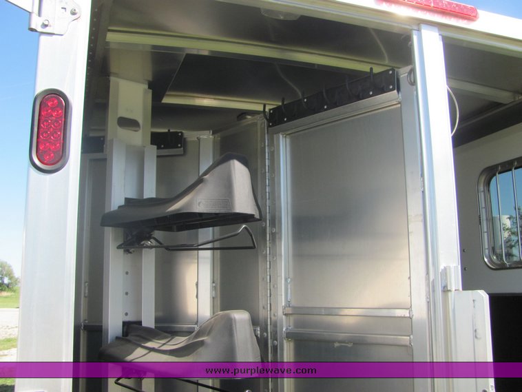 image for item 4567 2007 Feather Lite aluminum three horse slant trailer