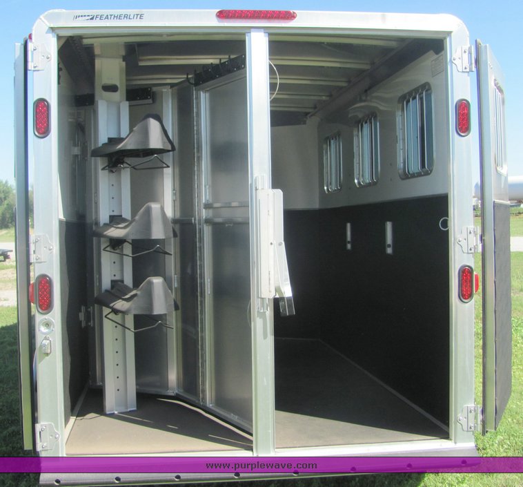 image for item 4567 2007 Feather Lite aluminum three horse slant trailer