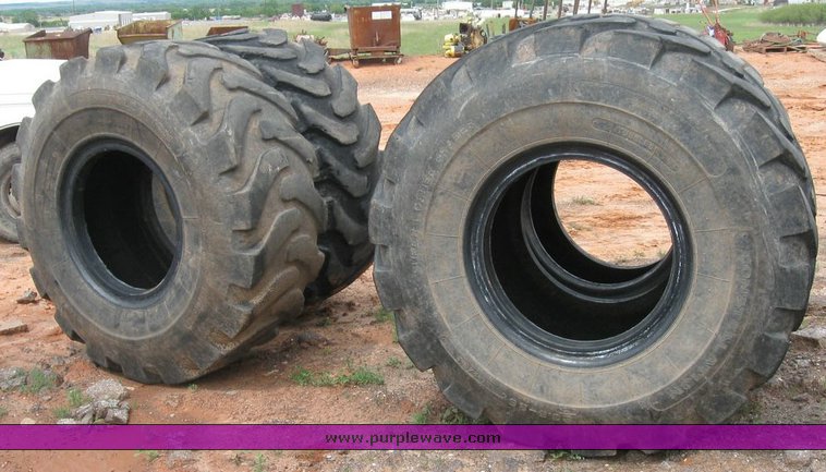 image for item 6329 (4) 23.5-25 tires