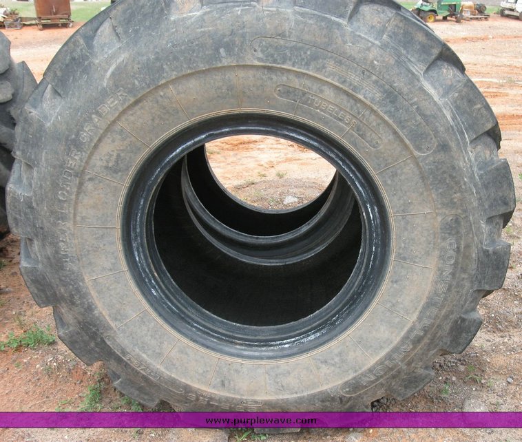 image for item 6329 (4) 23.5-25 tires