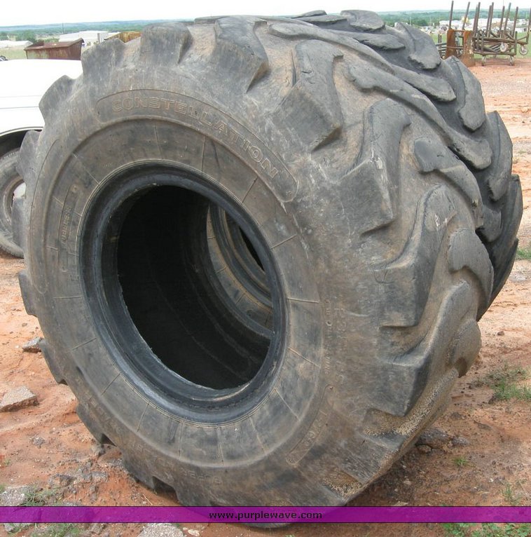 image for item 6329 (4) 23.5-25 tires
