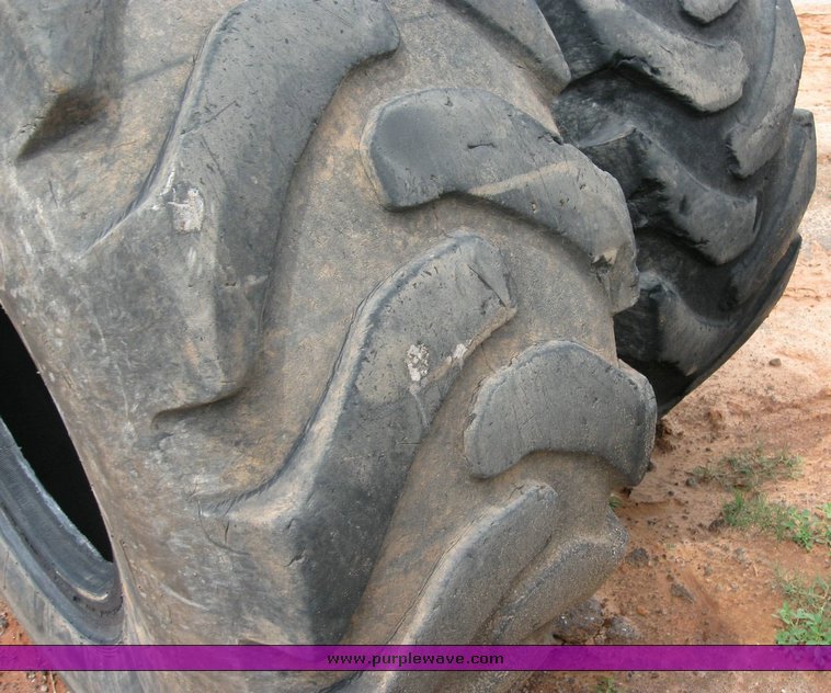 image for item 6329 (4) 23.5-25 tires