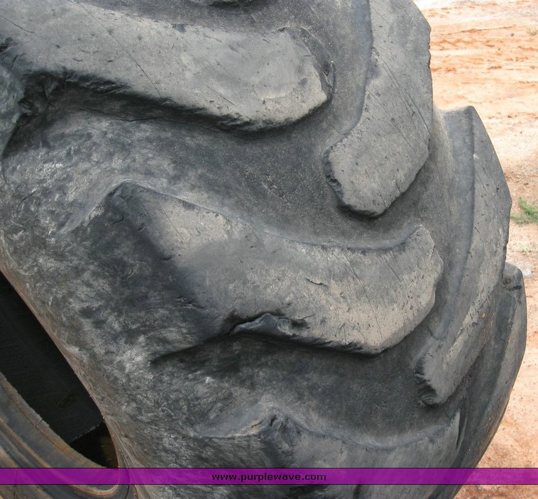 image for item 6329 (4) 23.5-25 tires