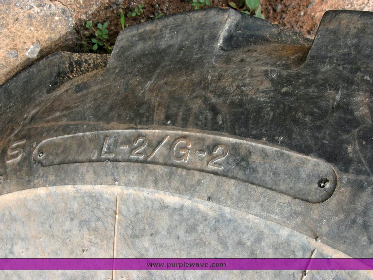 image for item 6329 (4) 23.5-25 tires