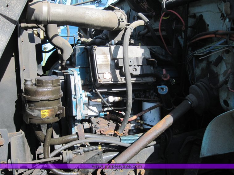 image for item 3818 2000 International Series 4700 dump truck