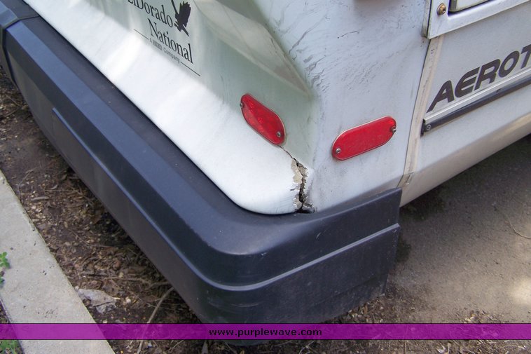 image for item 3899 2003 Ford E450 Super Duty transit bus