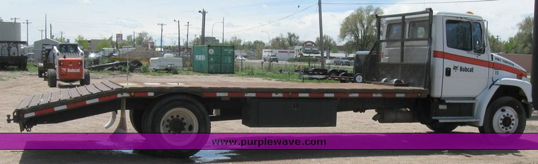 image for item 6706 2000 Freightliner FL70 flatbed truck