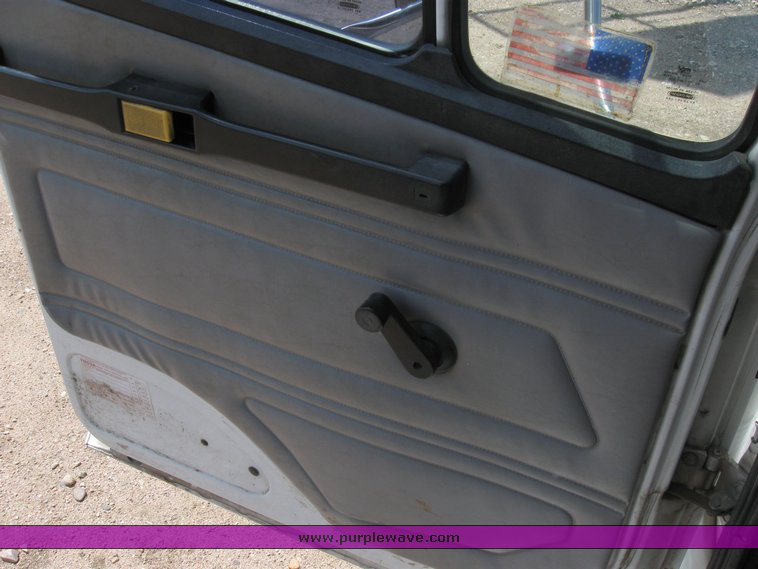 image for item 6706 2000 Freightliner FL70 flatbed truck