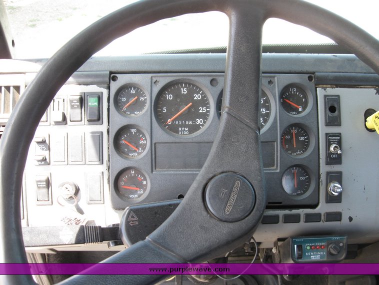 image for item 6706 2000 Freightliner FL70 flatbed truck