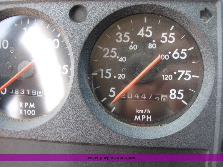 image for item 6706 2000 Freightliner FL70 flatbed truck