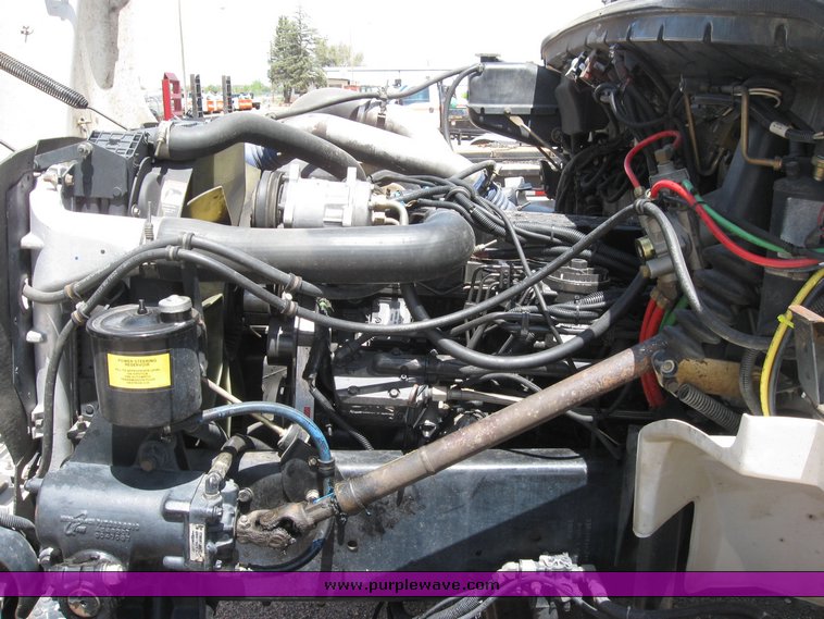 image for item 6706 2000 Freightliner FL70 flatbed truck