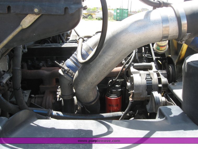 image for item 6706 2000 Freightliner FL70 flatbed truck