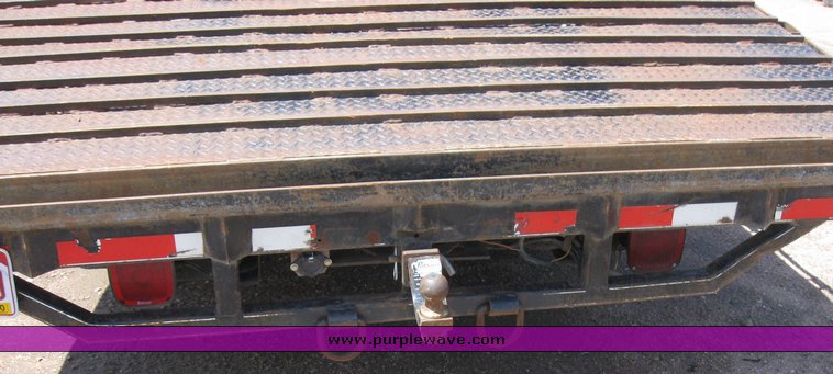 image for item 6706 2000 Freightliner FL70 flatbed truck