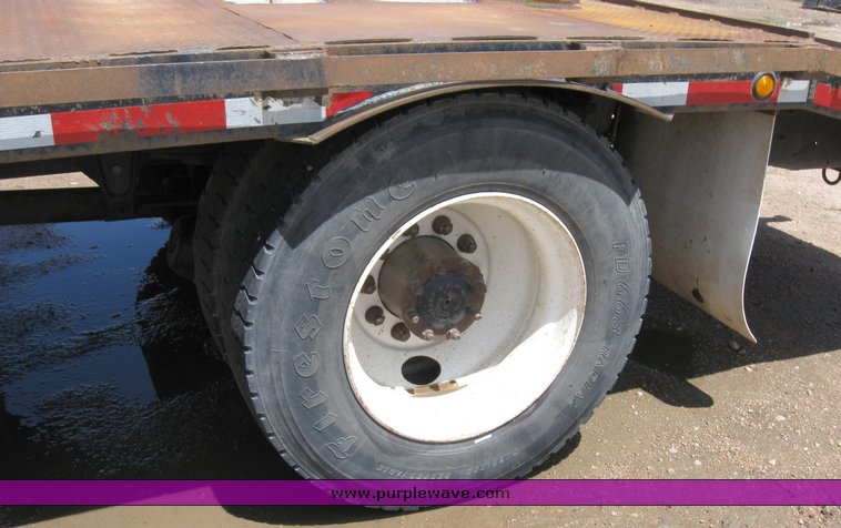 image for item 6706 2000 Freightliner FL70 flatbed truck