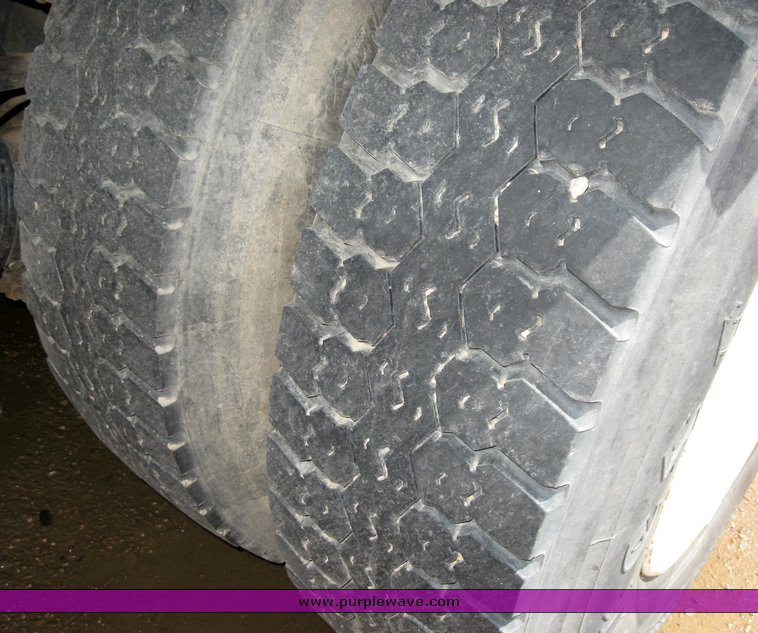 image for item 6706 2000 Freightliner FL70 flatbed truck