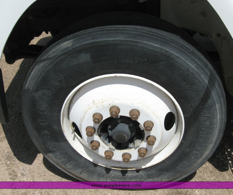 image for item 6706 2000 Freightliner FL70 flatbed truck