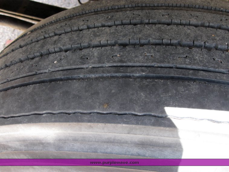 image for item 6706 2000 Freightliner FL70 flatbed truck