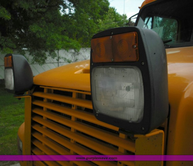 image for item 3496 2002 International Series 4900 crew cab dump truck