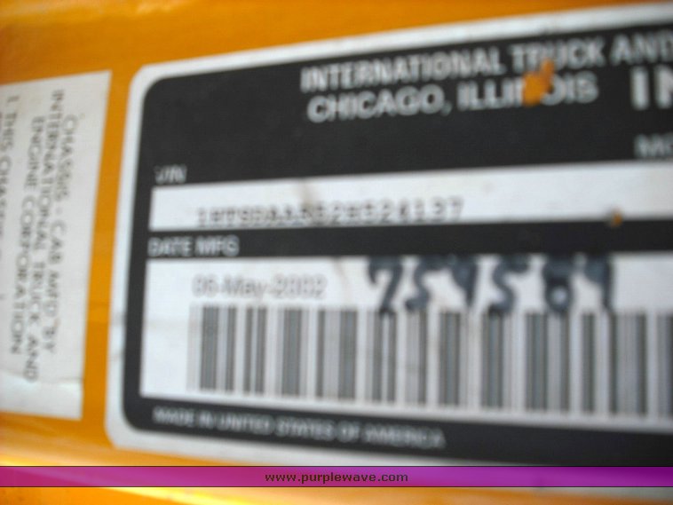 image for item 3496 2002 International Series 4900 crew cab dump truck