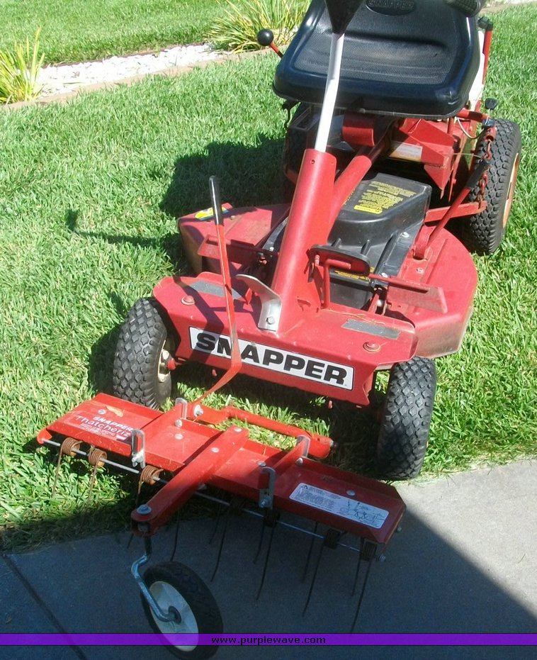 image for item 1904 Snapper 30" mower with front thatcher