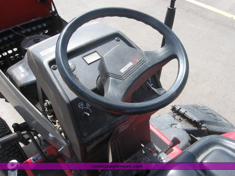 image for item 3992 Garden tractor with pull-beside mower and trim mower