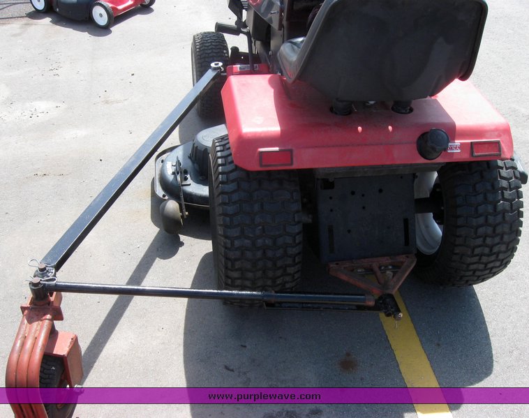 image for item 3992 Garden tractor with pull-beside mower and trim mower