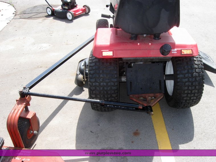 image for item 3992 Garden tractor with pull-beside mower and trim mower