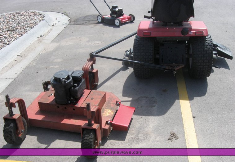 image for item 3992 Garden tractor with pull-beside mower and trim mower