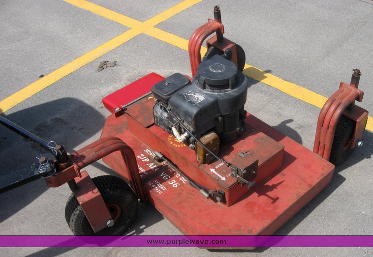 image for item 3992 Garden tractor with pull-beside mower and trim mower