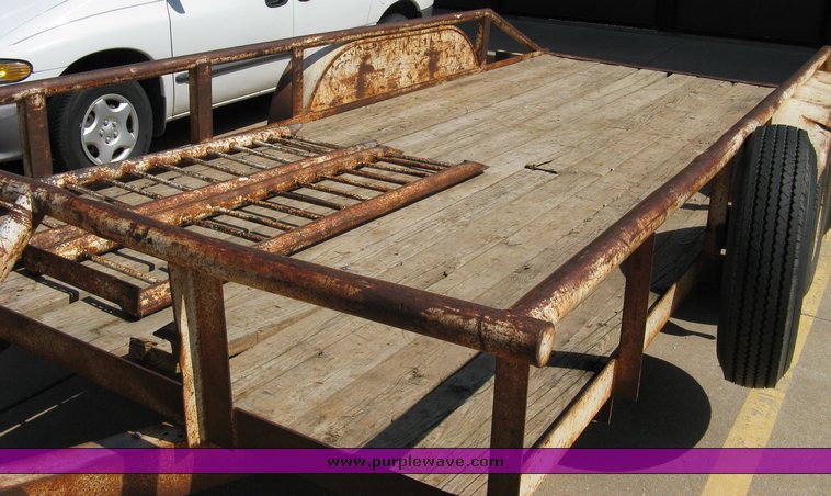 image for item 5012 16' tandem axle flat bed trailer