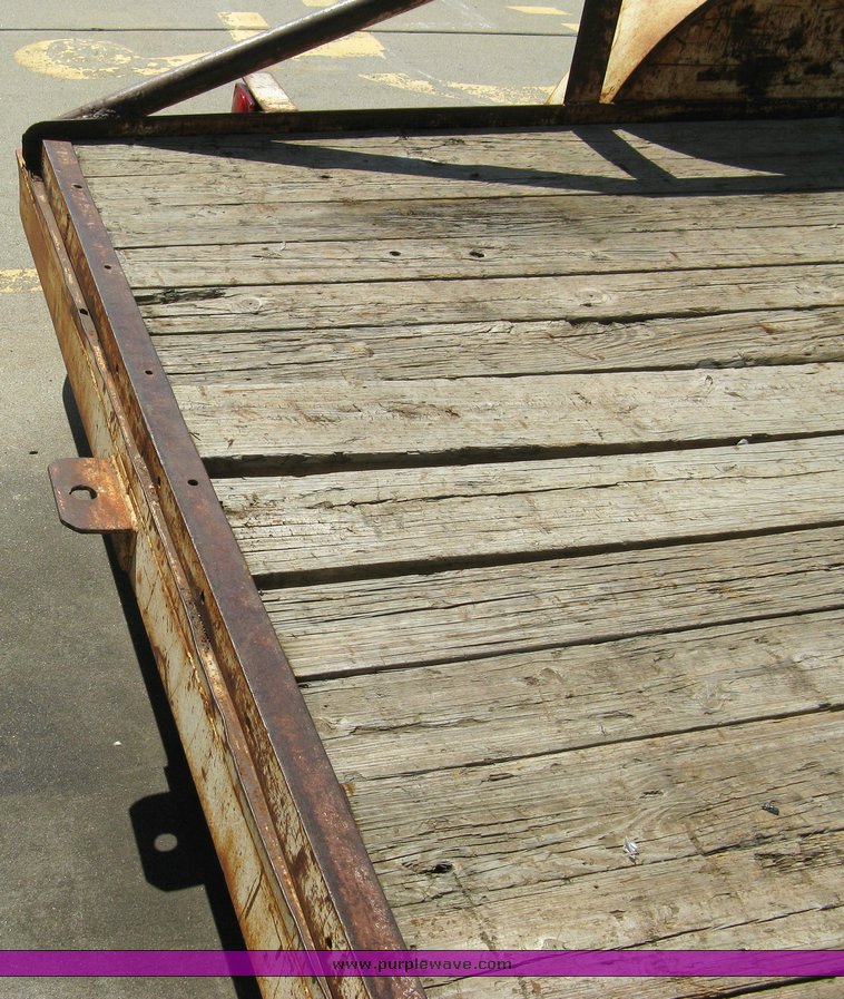 image for item 5012 16' tandem axle flat bed trailer