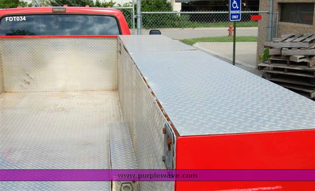 image for item 1000 1990 Ford F450 Super Duty truck with service body