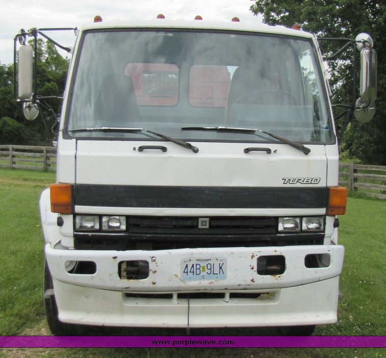 image for item 3326 1987 GMC 7000 forward cab over 24' rollback truck