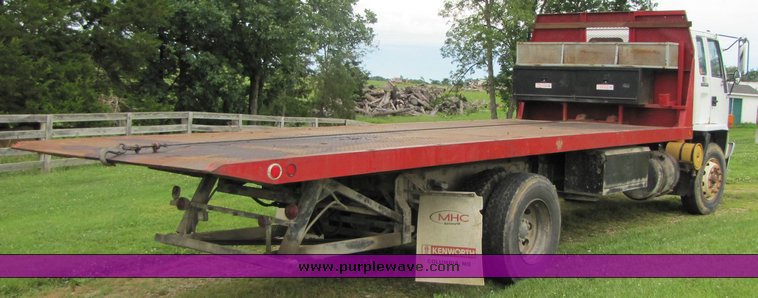image for item 3326 1987 GMC 7000 forward cab over 24' rollback truck